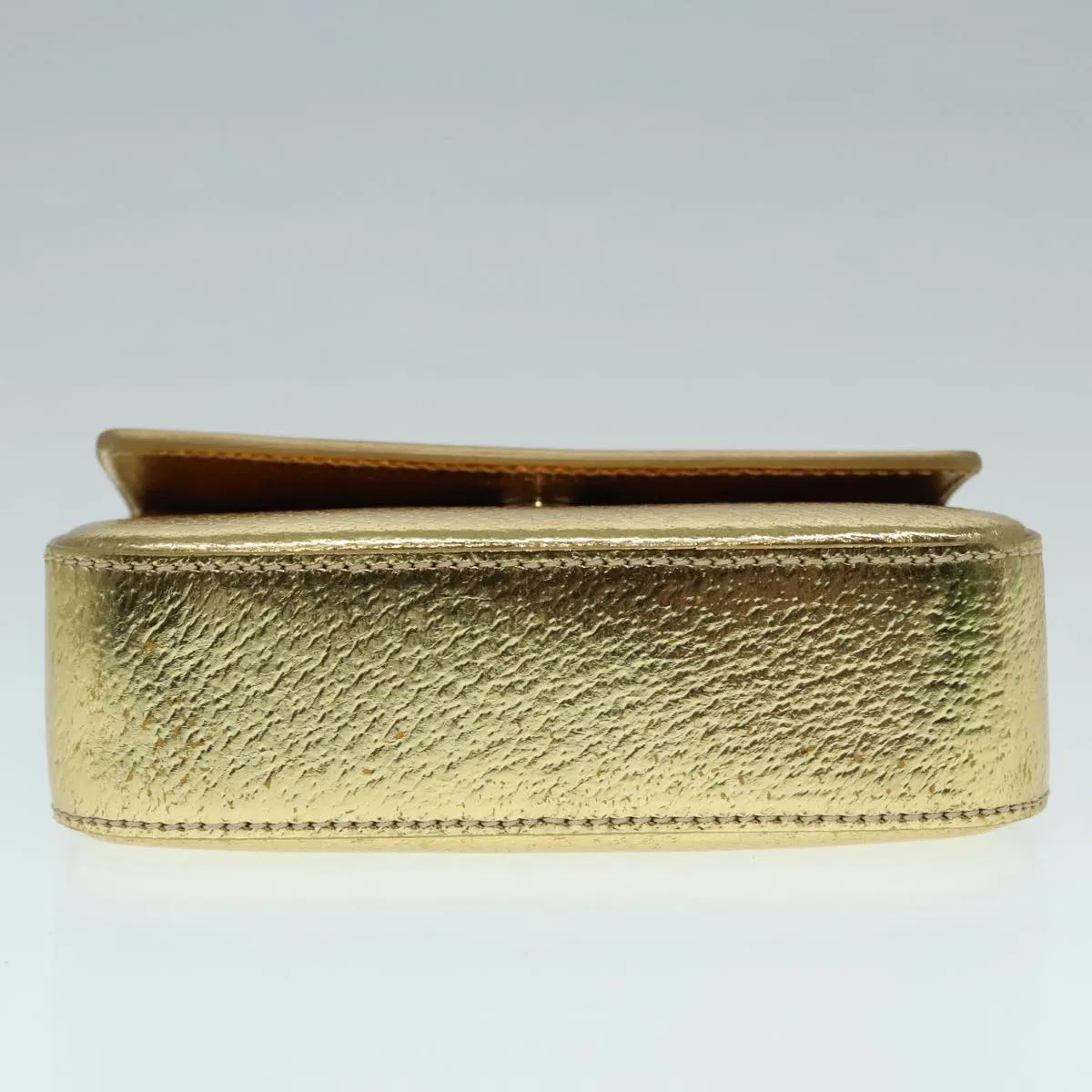 Prada -- Gold Leather Accessories