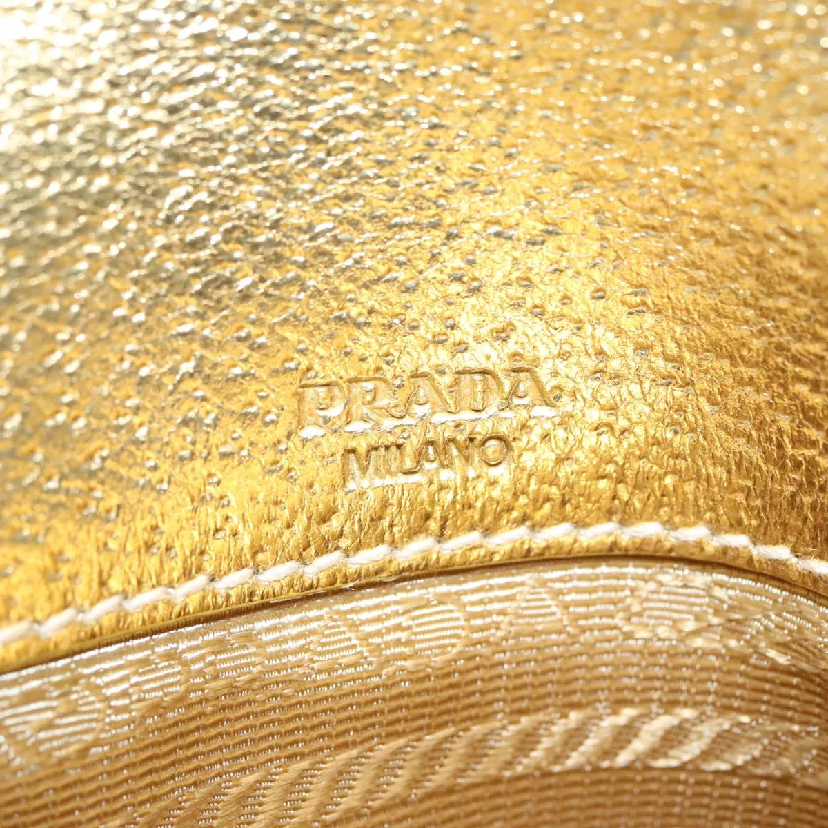 Prada -- Gold Leather Accessories